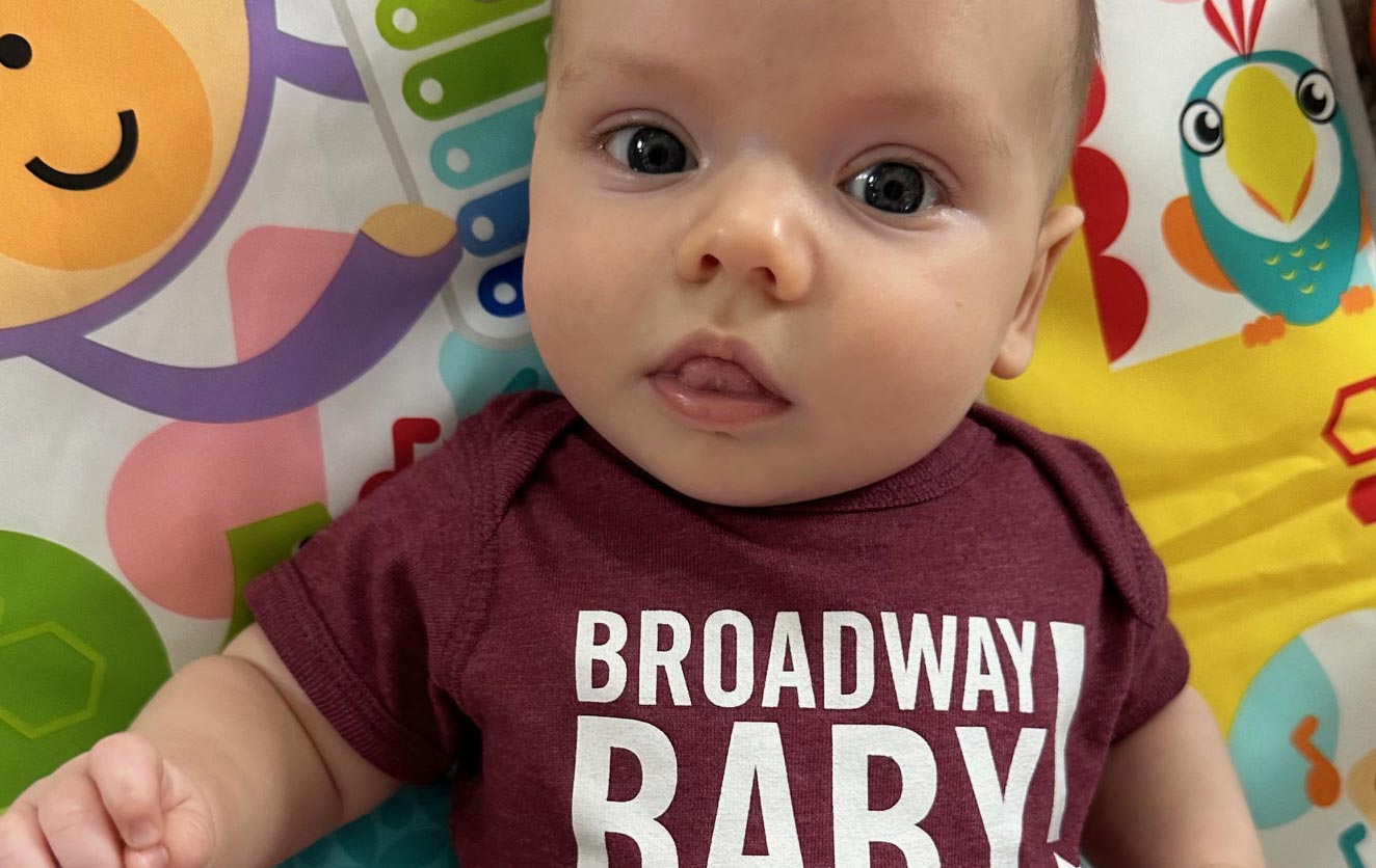 Baby wearing a Playhouse Square t-shirt